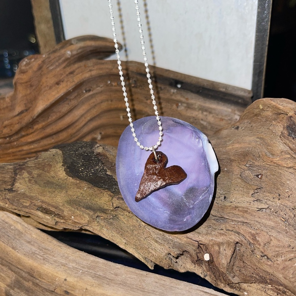 Hand carved pendant